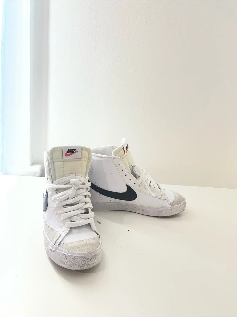 Nike Kids White High-Top Sneakers with Black Swoosh